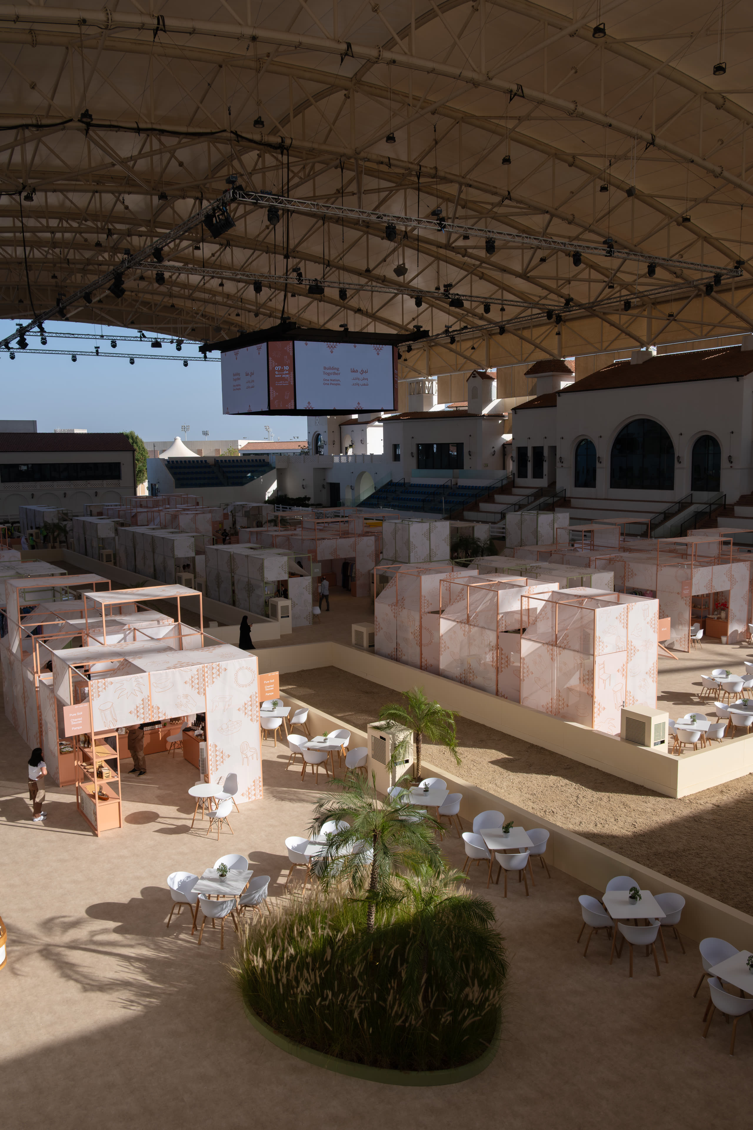 Emirates Signature exhibition hall with central screens